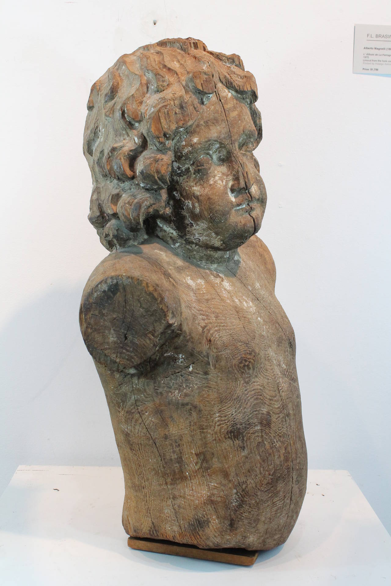 Fantastic presence on this 19th Century carved pine bust.
Remnants of original paint remain.
The figure may have been an angel , in that there are remains of the dowel attachments for the wings upon his back.
The top of the head has a hole which