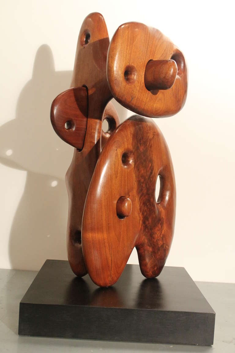 Noguchi inspired amazing 4 piece Modernist jig saw puzzle sculpture.
It has a breath taking presence and a nice large scale.
It is stunning from every angle.
The final image shows it disassembled. The pieces slide into each other and can only fit