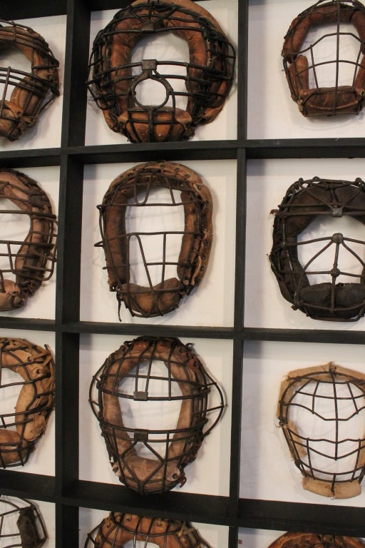 Contemporary Collection of 25 Mounted Baseball Catcher's Masks