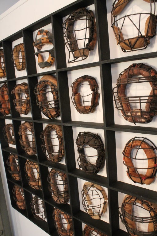 Collection of 25 Mounted Baseball Catcher's Masks 1