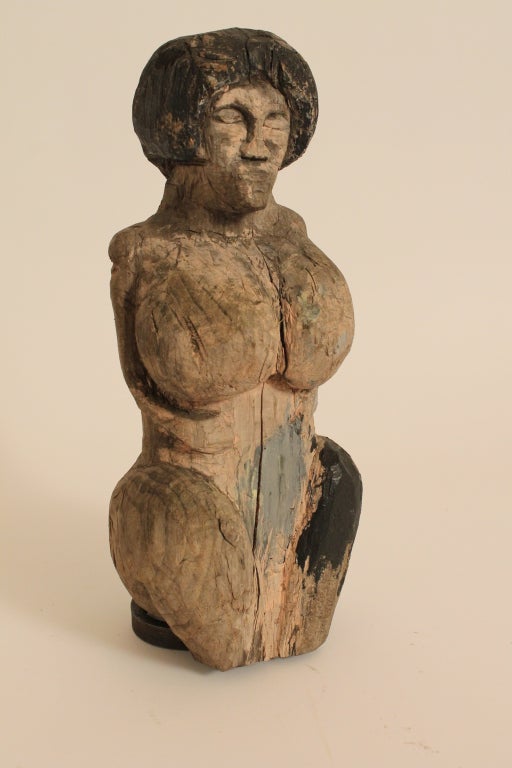 Ebullient African American carved wood folk art fertility figure.
Wonderful form and a very strong naive presence with a curiously random painted surface.
Sits on an iron armiture.