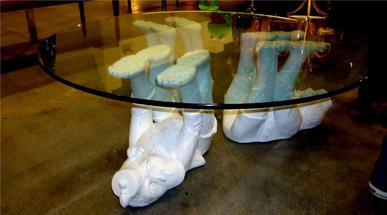 Three Monkeys composite coffee table, each figurine signed Carsuk and Continental Studio.