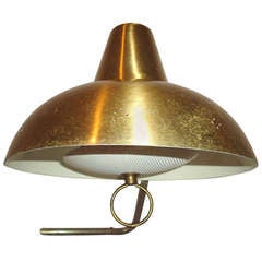 Paavo Tynell for Taito Perforated Polished Brass  Wall Lamp with Counterweight