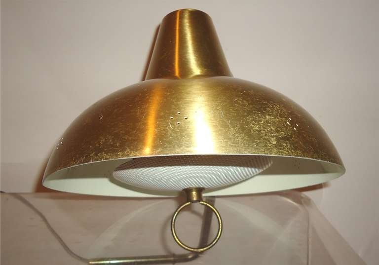 Paavo Tynell for Taito Perforated Polished Brass  Wall Lamp with Counterweight