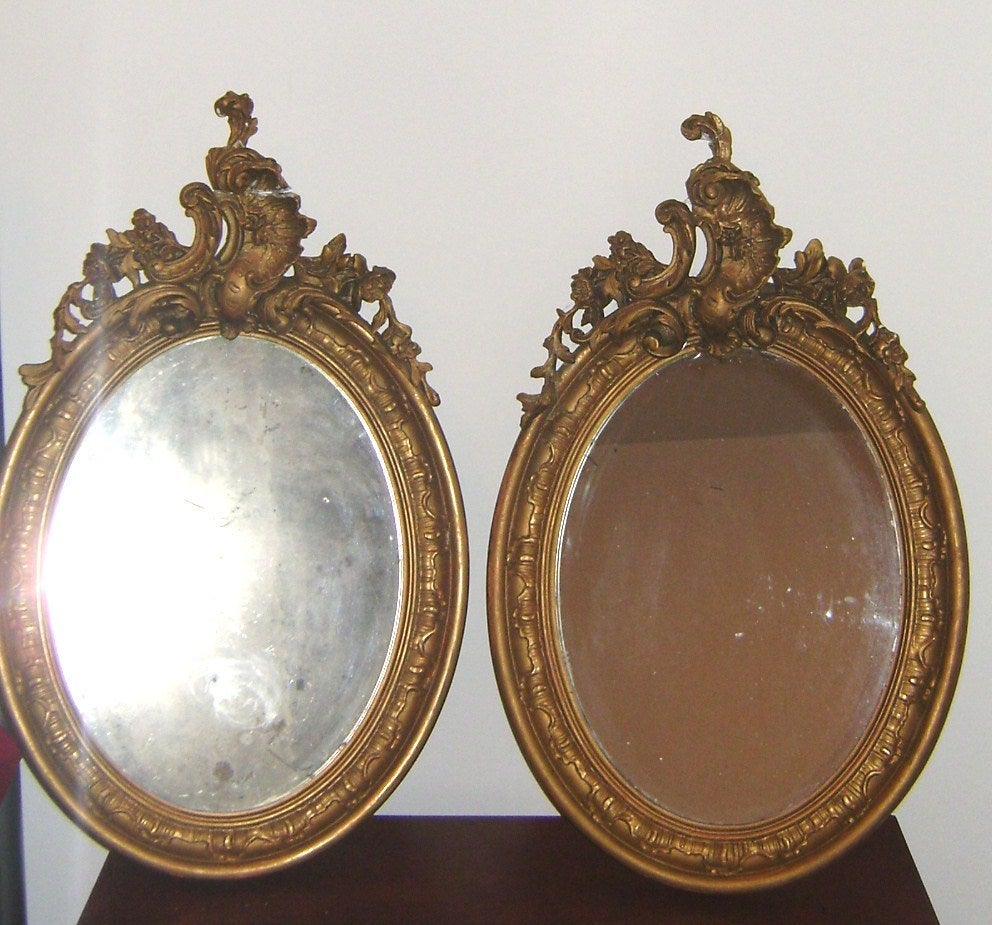 Gustavian Pair of Oval 19 th Century Mirrors with Rosettes