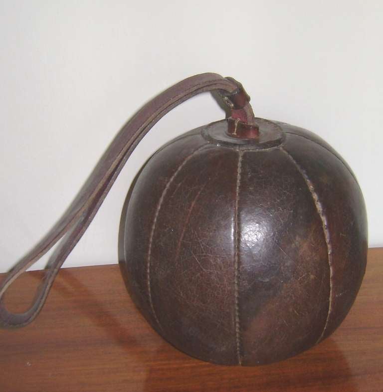 handsewn leather antique boxer's punch ball.