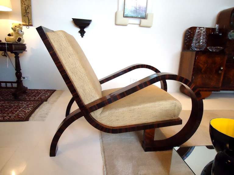 Stunning pair of Art deco walnut veneer armchairs.