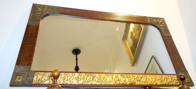 Ecclectique 19 c Mirror with gilded metal relief decoration.