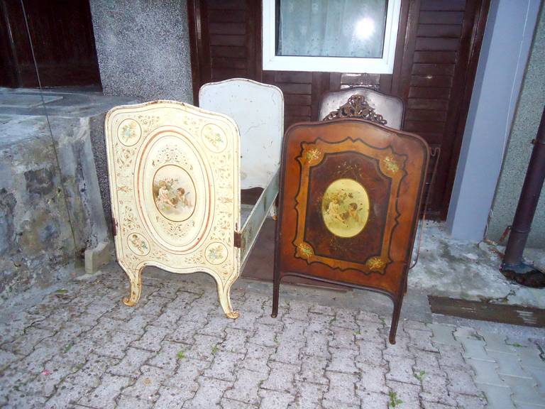 19 th c antique pair of toll painted beds, somewhat smaller size, childrens or to e made as a beautiful settees.