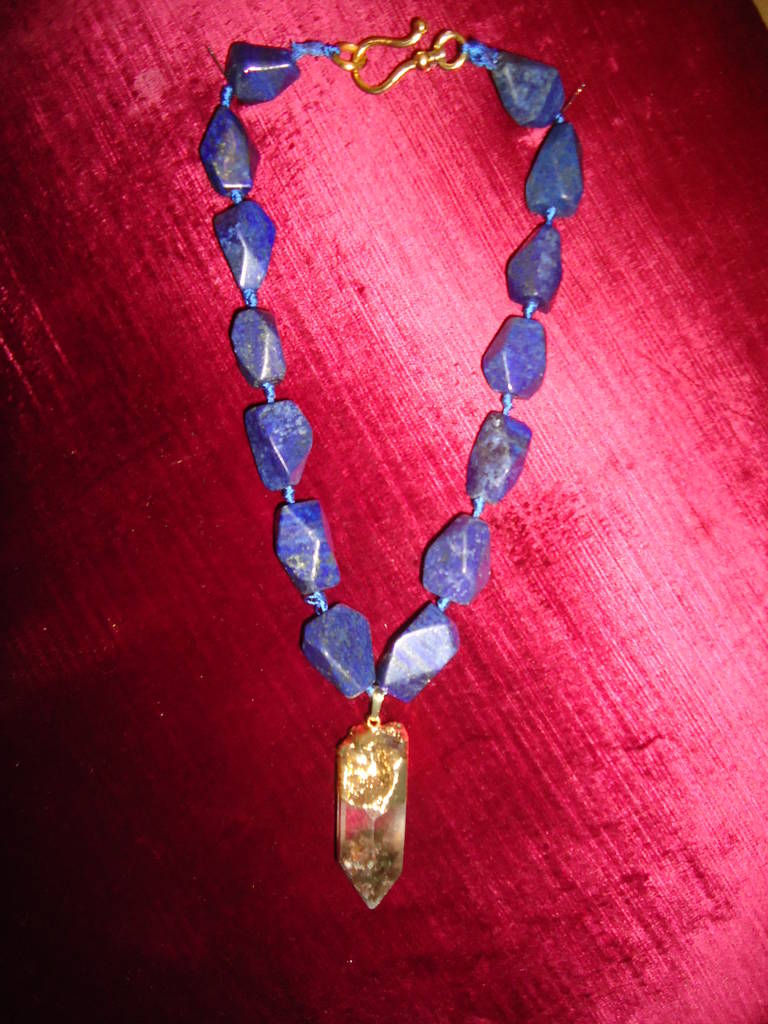 Absolutely spectacular sodalite and quartz crystal necklace.