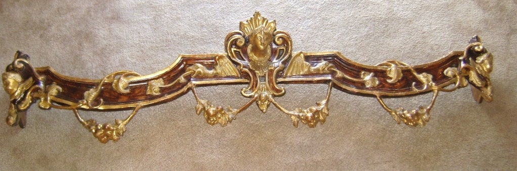 Spectacular Gustavian Papier Mache gilded cornice/valance highly decorated in  foliage, animals and scrolls, with a head of Medusa in the center, angels on the corners and griffins in the middle.
