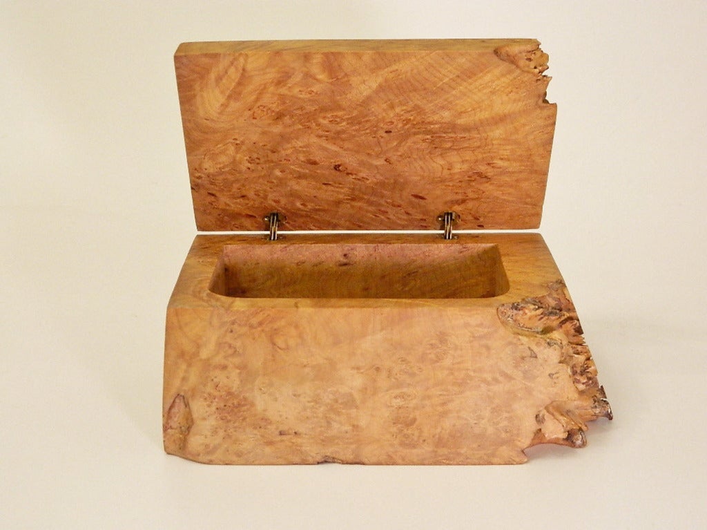 Outstanding hand carved jewelry box in burled birdseye maple. Made from one piece of wood. Signed and dated.