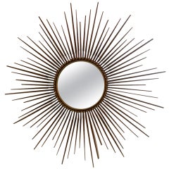 French gilt metal sunburst mirror Chaty Vallauris