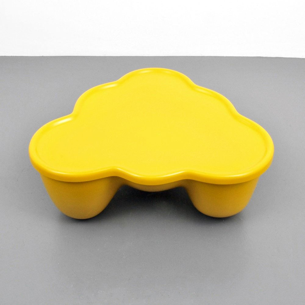 A Molar coffee table in brilliant canary yellow color designed by Wendell Castle and manufactured by Beylerian, circa 1970s. The molar series is a playful design from Wendell Castle's versatile repertoire that uses the reinforced fiberglass to
