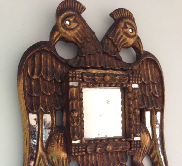 Colonial espagnol Miroir colonial espagnol ancien avec cadre en bois sculpté et doré