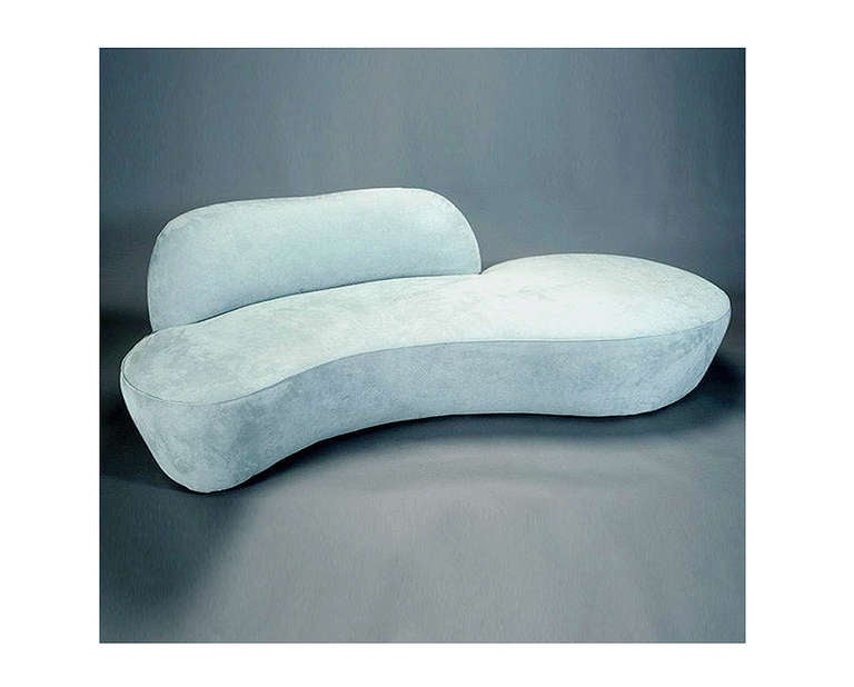 A sculptural cloud sofa designed by Vladimir Kagan for Directional. Curved free form showcases Kagan's design in the 70s and the cloud sofa is one of the best such examples of his work from that decade. This sofa is an authentic vintage circa 1970s,