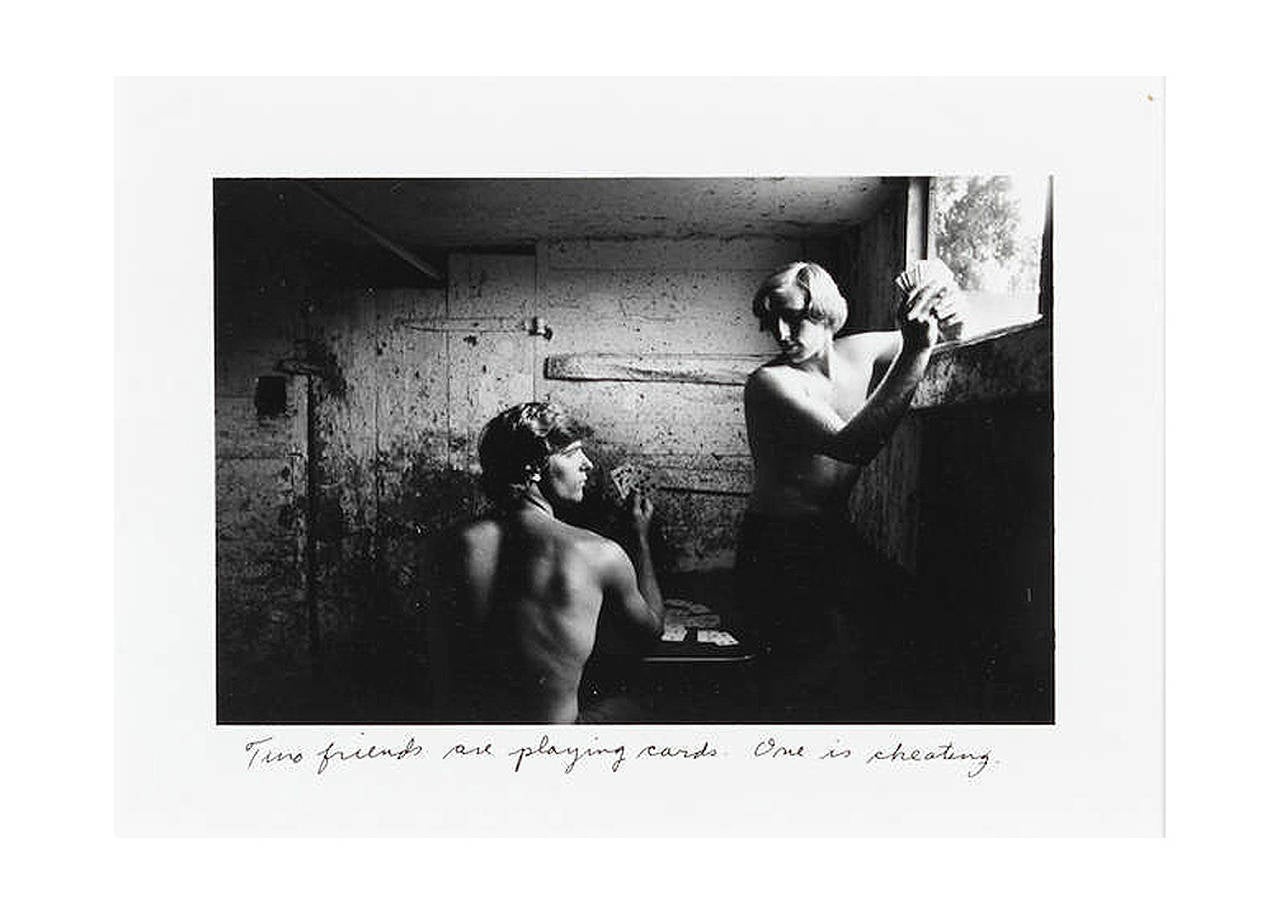 A photogaph by Duane Michals (born 1932).
"Two friends are playing cards. One is cheating" from Homage to Cavafy Series circa 1970s'.
Gelatin silver print, signed, titled and numbered 14/25 in ink in the margin; 
3 1/2 x 5in image size.