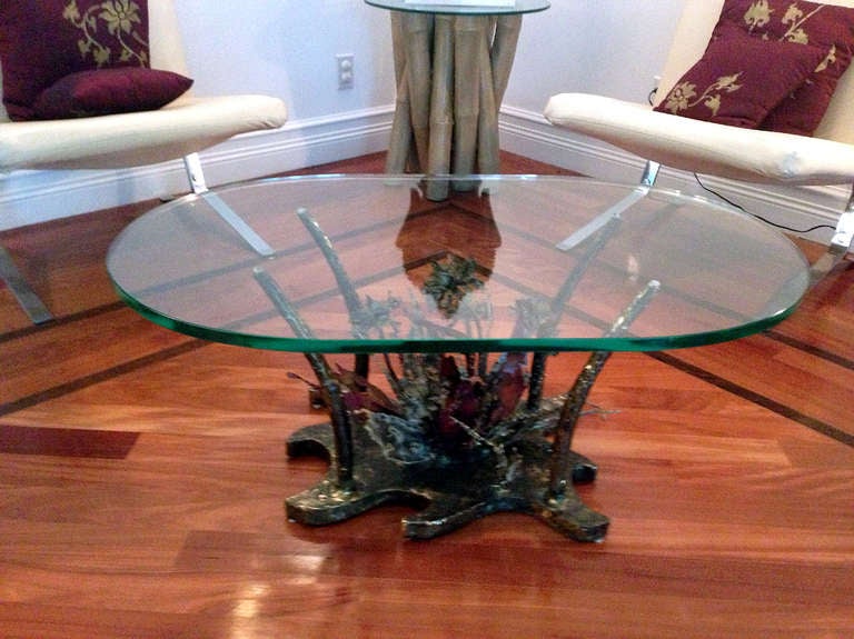 Designed and crafted by Sila Seandel in his New York studio circa 1970s. This table base is made of torched and welded bronze with enamel coating that depicts an exotic array of  flora with a touch of abstract brutalism, iconic series featuring