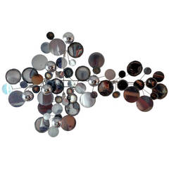 Raindrop chrome wall sculpture by C. Jere