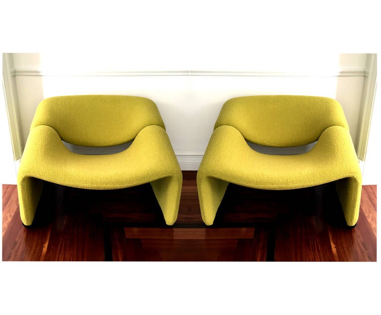 A pair of lounge or club chairs called 