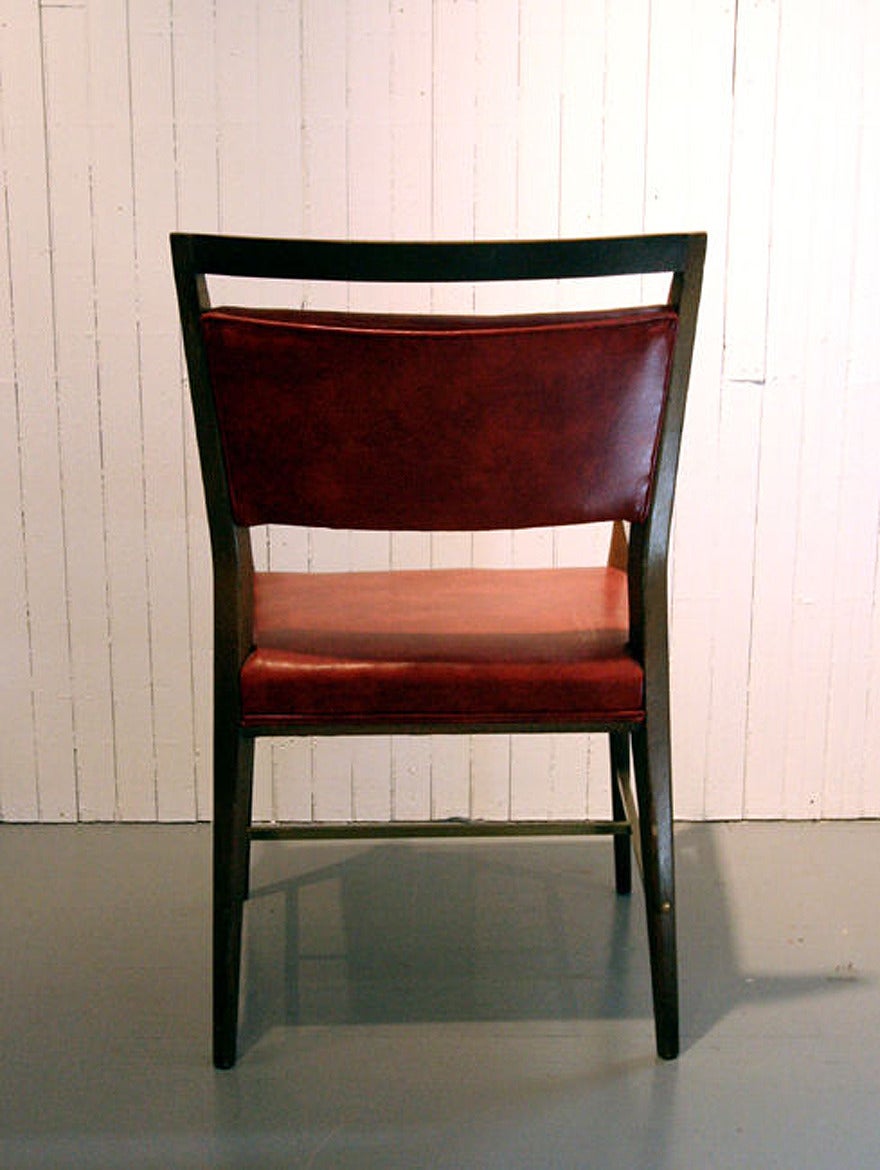 Mahogany A set of four dining chairs by Paul McCobb