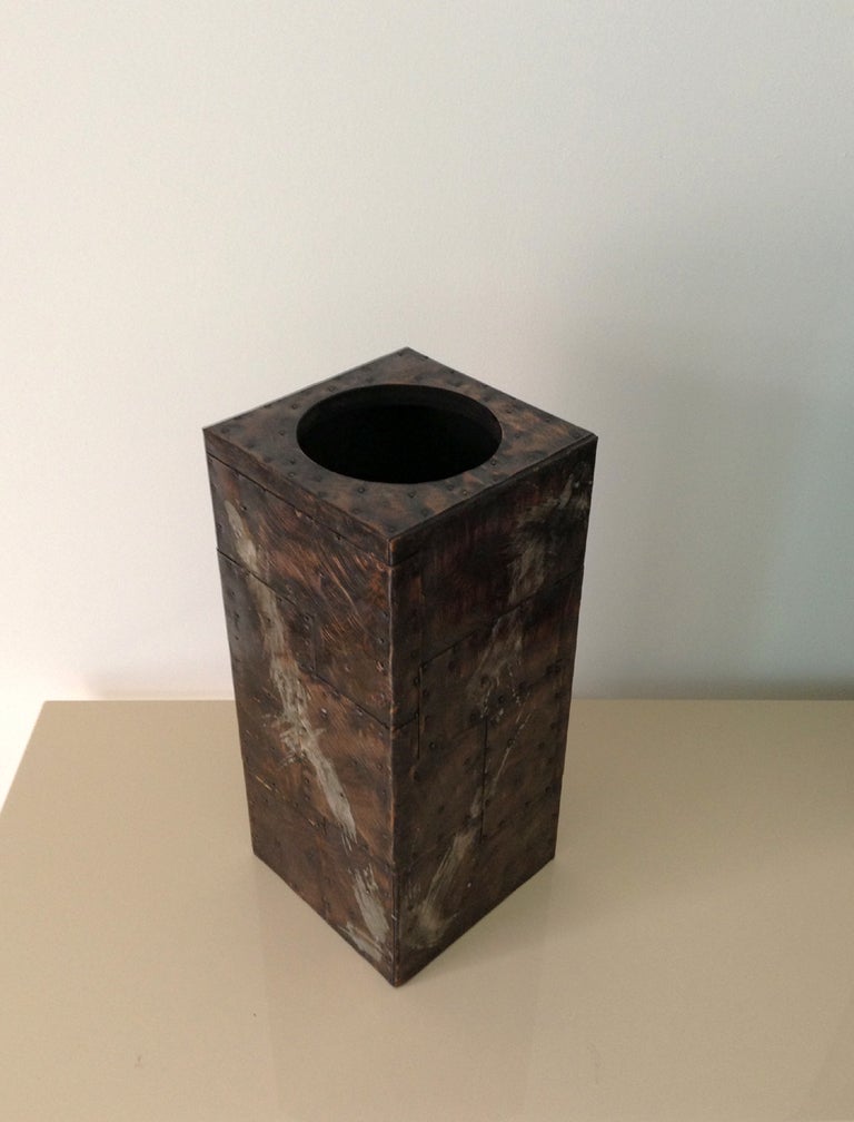 A cubism vase or which can function as a stand with a top try crafted by Paul Evans studio in New Hope, PA. Circa 1970s. Veneered with overlapping copper metal sheet with handmade nails, brushed on with patinated patterns and free form pewter
