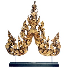 A mounted gilded antique doorway panel Thailand