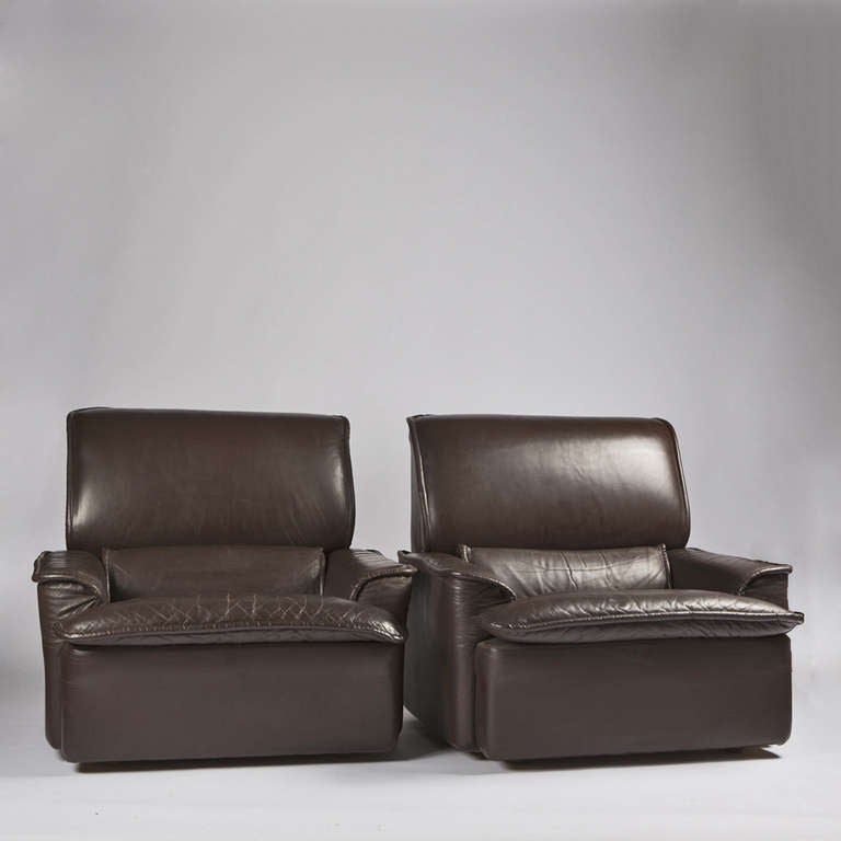 Rare set of two upholstered armchairs bin the style of Achille and Pier Giacomo Castiglioni for Zanotta.
Dark brown leather with appropriate patina.