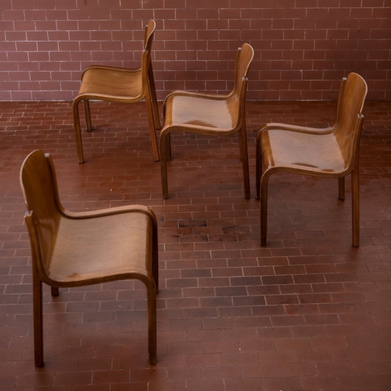 Set of four beautifully curved plywood dining chairs. All in excellent condition.