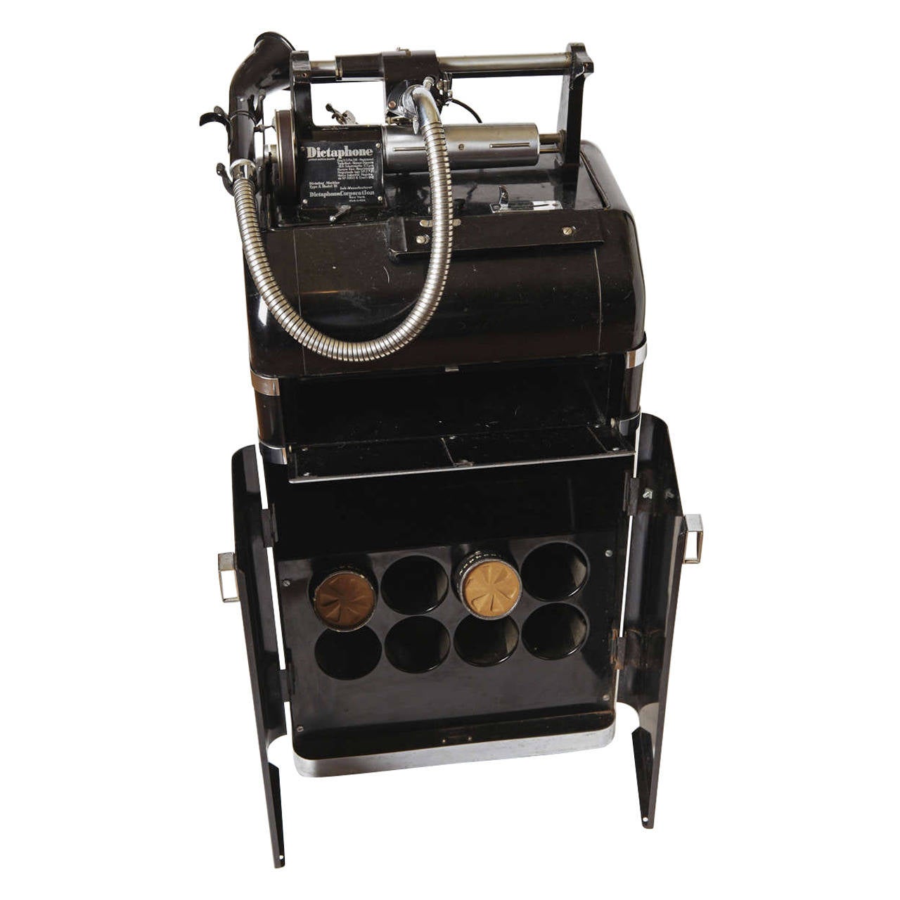 Classic black enamel and chromed-steel machine age case.<br />
Signed removable hood.<br />
Integral power cord receptacle, retains original cord.<br />
Extremely clean interior and mechanicals.<br />
Some normal wear from use to exterior, as