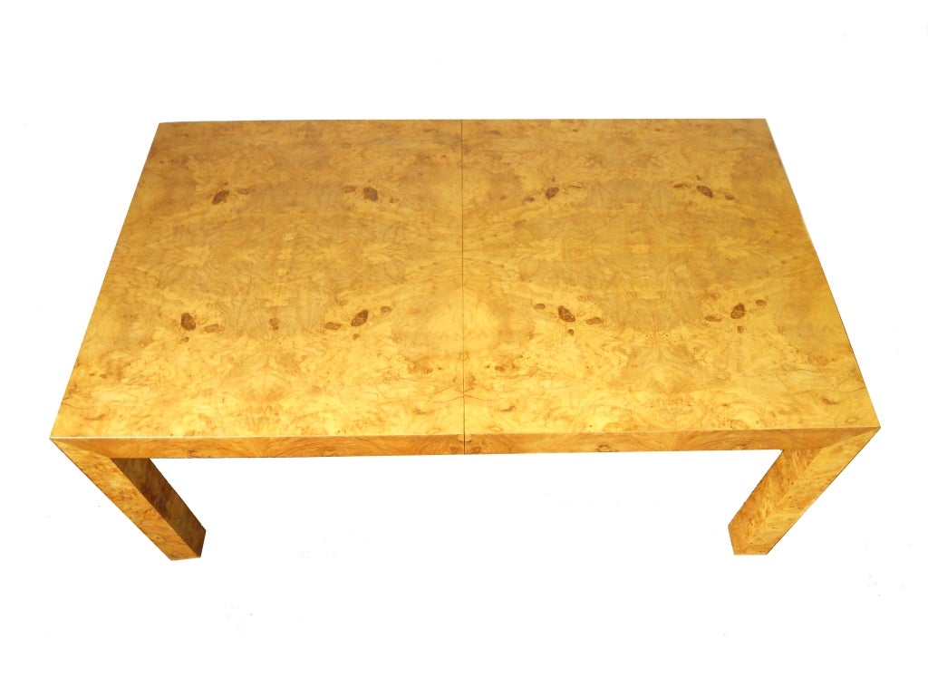 Burl wood dining table by Milo Baughman . 66