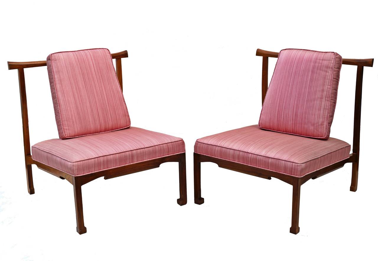 Pair of Asian form lounge chairs attributed to James Mont.