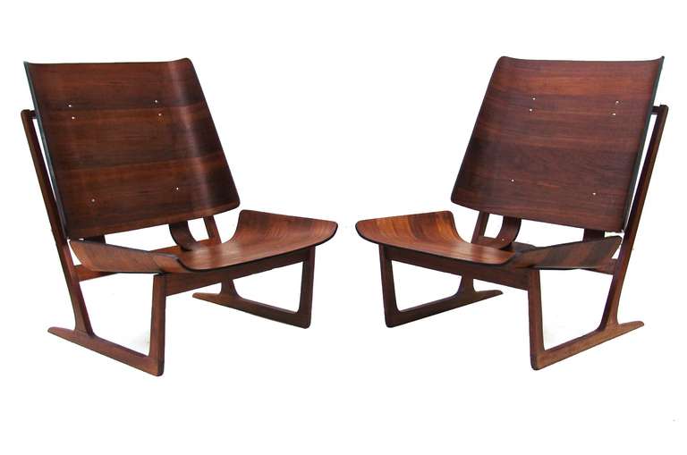 Pair of Danish modern teak lounge chairs by Grete Jalk.