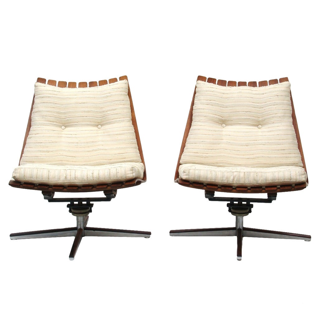 Pair of Hans Brattrud Rosewood Swivel Lounge Chairs