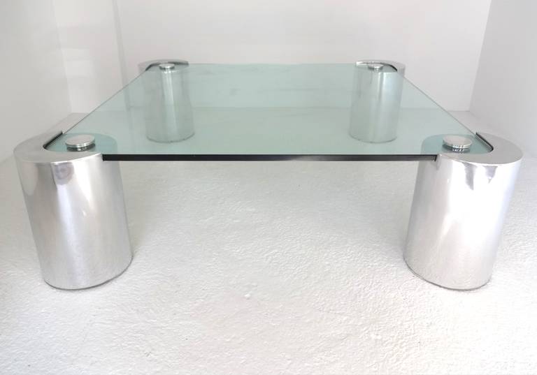 Karl Springer coffee table. Size is 16 height, 10 diameter of legs, glass is 41 x 41.