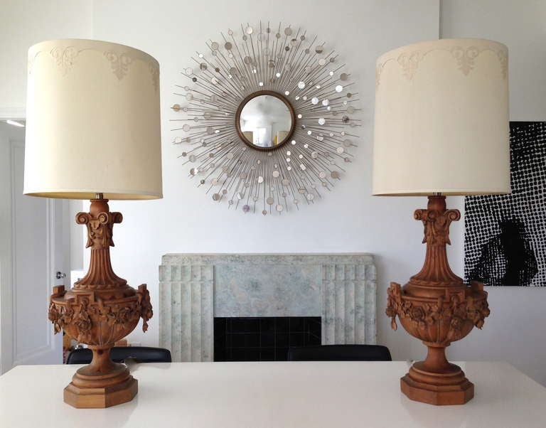 Stunning pair of monumental Hollywood Regency style wooden urn form table lamps by Marbro Lighting, c. 1963. These Impressive Mid-Century Modern lamps were commissioned and carved by the artisans of The Marbro Lighting Company in 1963 for a