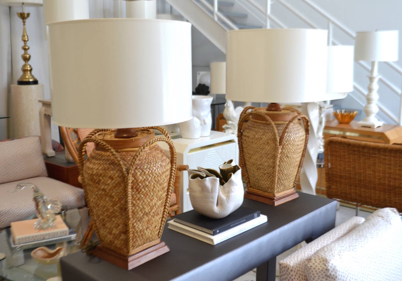 Striking pair of natural woven rattan and bamboo basket table lamps, c. 1950s - 1960s.
Shades not included. 
Overall dimensions:
31