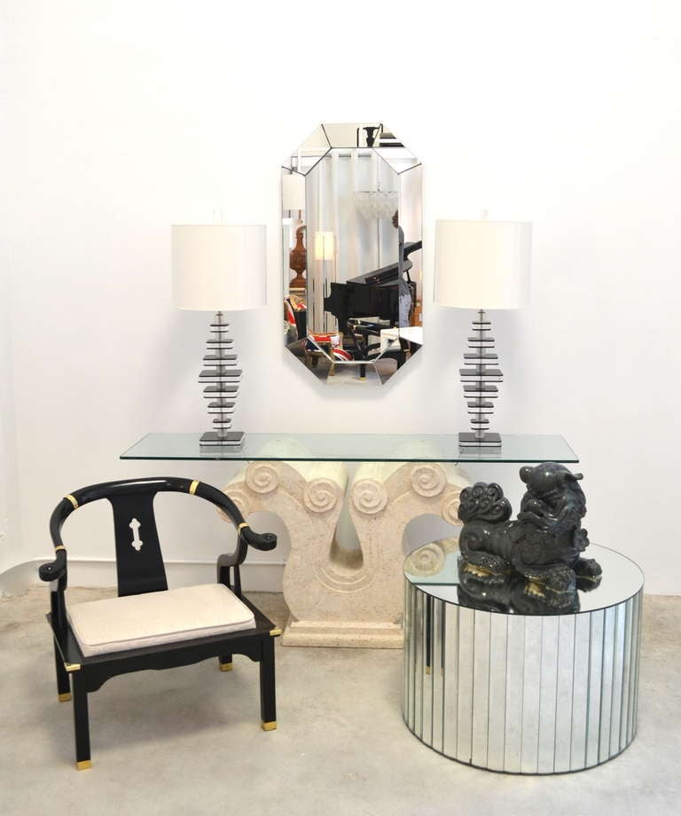 Glamorous Art Deco Revival coral stone console table with glass top, c. 1980s. This incredible carved stone sofa table of rolling wave design is highly decorative and finished on both sides.
Visit our collection and new showrooms in South Beach and