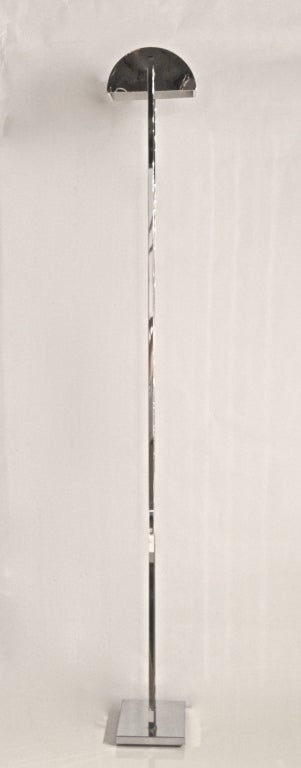 Sleek polished chrome floor lamp. This modern standing lamp by Koch & Lowy features an articulated chrome shade which allows for directional lighting. c.1969
(www.PatrickMoultney.com)