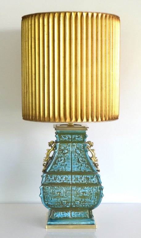 Glamorous Asian inspired ceramic table lamp by Stiffel. c. 1940s -1950s. This Hollywood  Regency style aqua and green glazed ceramic lamp is mounted on a brass base and decorated with patinated brass accents. Shade not included.