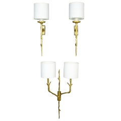 Suite of 3 branch- motif bronze sconces in the style of Agostini