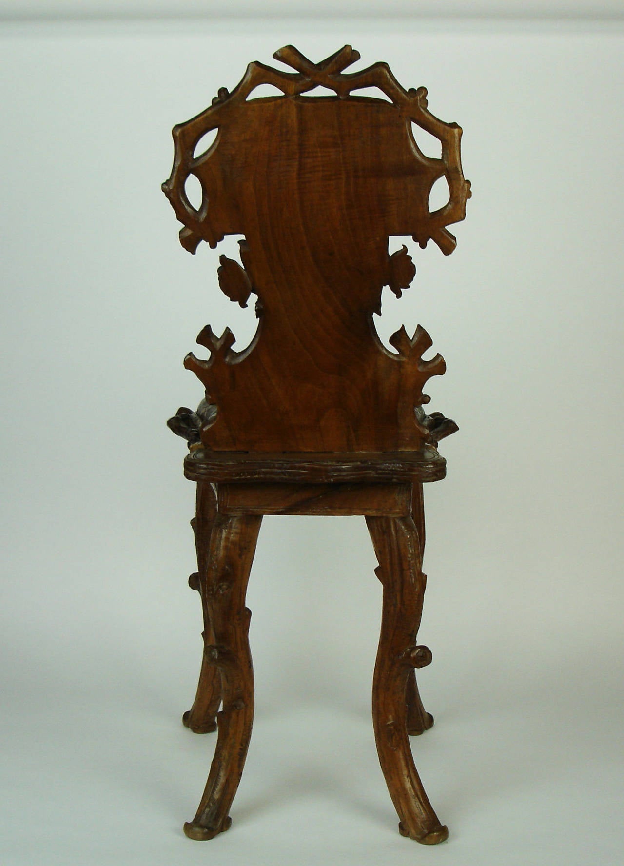 Carved Black Forest Chair For Sale
