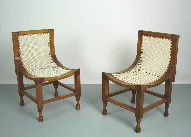 Two beech wood chairs ,seating and back in strings.