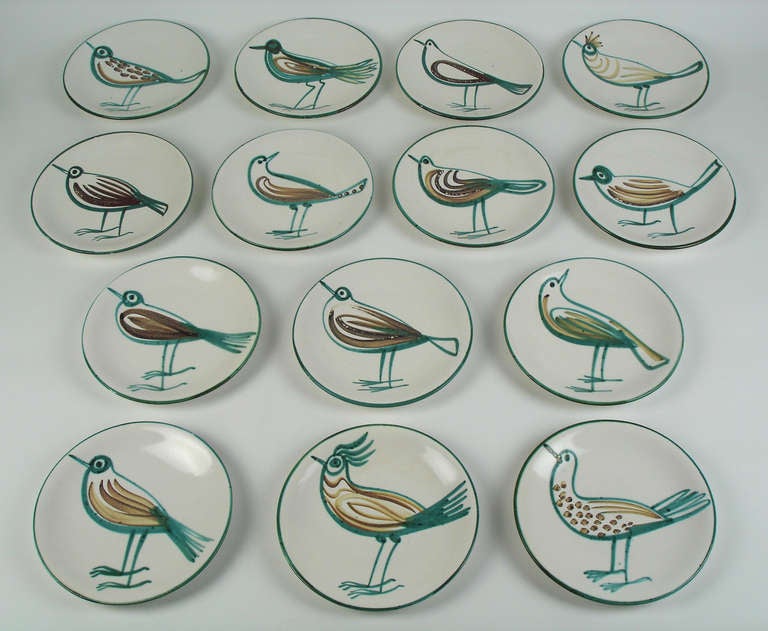 Dishes decorated with birds,each bird beeing different from others.
signed RP.under each dish