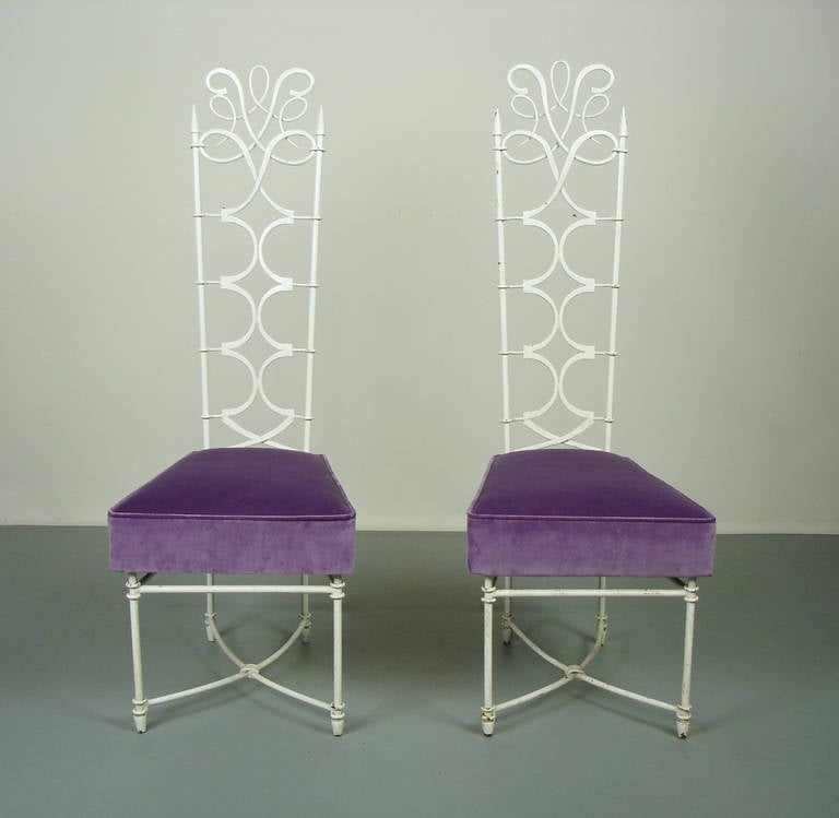 Two 1940's style chairs with white enameled wrought iron structures and recent purple velvet upholster.