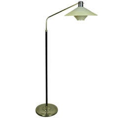 An Adjustable Floor Lamp by Lunel
