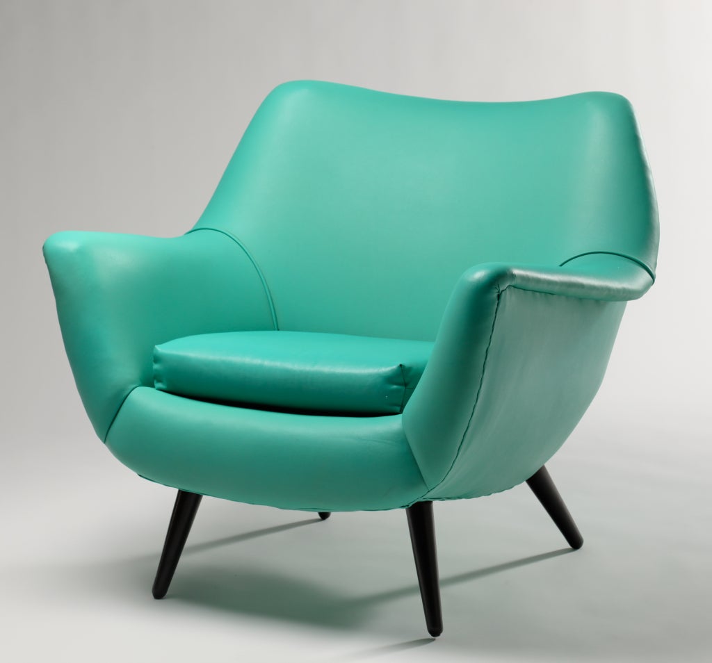Pair of mid-century armchairs in original turquoise Naugahyde. Generously proportioned and reminiscent of a Gio Ponti design.