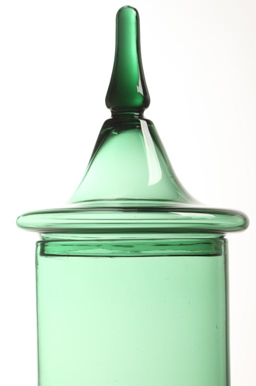 Emerald green glass bottle with a striking silhouette, attributed to Gio Ponti for Empoli.