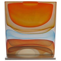 "Infusion Block in Orange, Gold, Blue, and Cherry"  by Jamie Harris