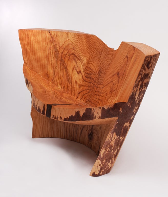 Chainsaw carved Pine Chair by designer/maker Howard Werner. Carved surface of the piece echos the natural grain of the wood. Unique.